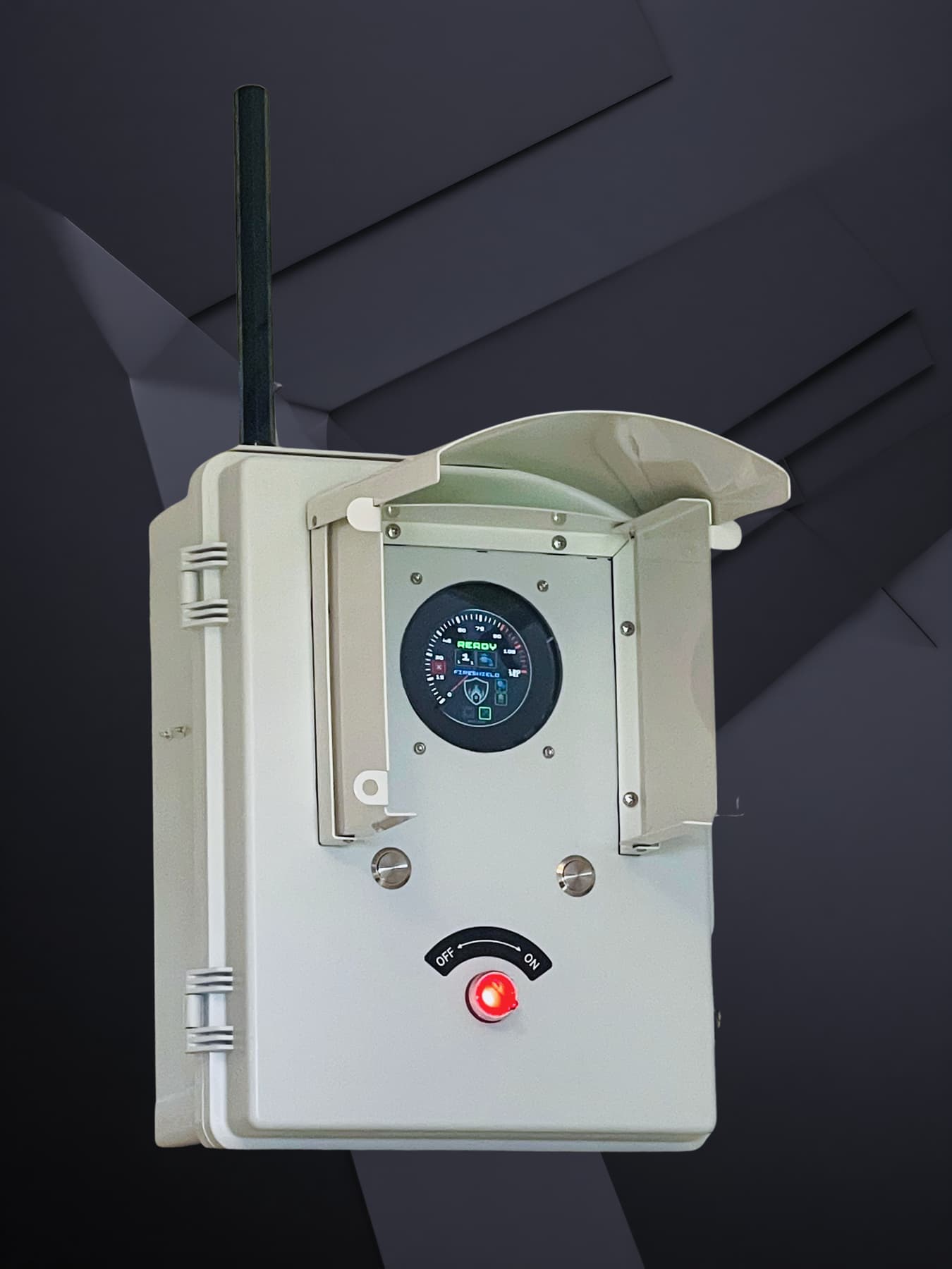 The FireShield controller: weather-rated enclosure with antenna, solar shield over the status display, two buttons and a red manual override